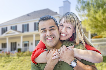 Image showing Happy Mixed Race Couple in Front of House