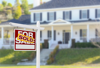 Image showing Sold Home For Sale Sign in Front of New House