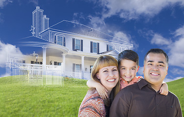 Image showing Young Mixed Race Family and Ghosted House Drawing on Grass