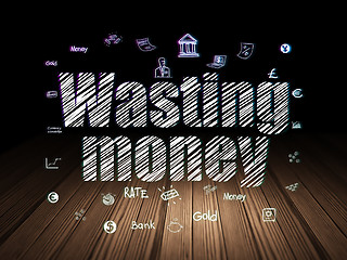 Image showing Banking concept: Wasting Money in grunge dark room