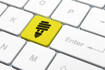 Image showing Business concept: Energy Saving Lamp on computer keyboard background