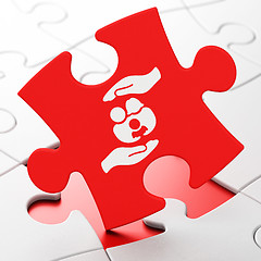 Image showing Insurance concept: Family And Palm on puzzle background