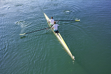 Image showing Two rowers in a boat