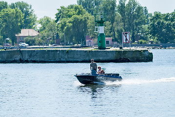 Image showing Men go on the boat is Baltiysk. Russia