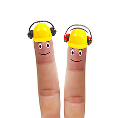 Image showing Two fingers in helmet with headphones