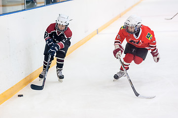 Image showing Game of children ice-hockey teams