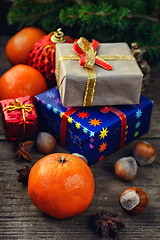 Image showing Christmas gifts and symbols of the holiday