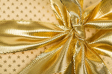 Image showing detail of golden ribbon