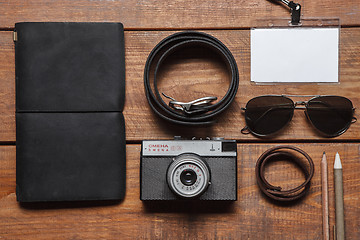 Image showing Men\'s accessories on the wooden table