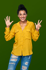 Image showing Woman showing eight fingers
