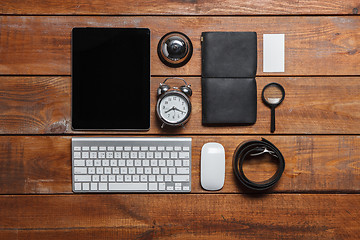 Image showing Men\'s accessories on the wooden table