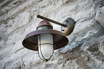 Image showing Street lamp on a wall, close-up