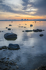 Image showing Beautiful sunrise on the sea. Views of Tallinn.