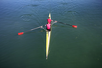 Image showing Two rowers in a boat