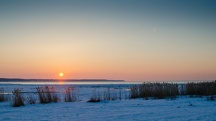 Image showing Winter sunset on the sea. The Gulf of Finland