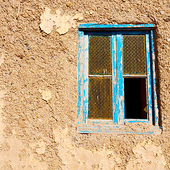 Image showing blue window in morocco africa old construction and brown wall  c