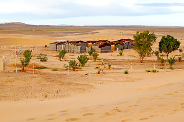 Image showing tent in  the desert  sahara and rock       sky