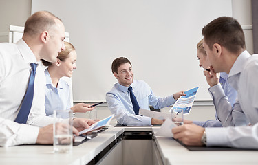 Image showing group of smiling businesspeople meeting in office