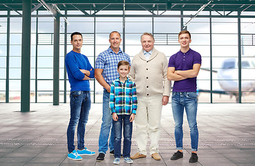 Image showing group of men and boy over airport terminal