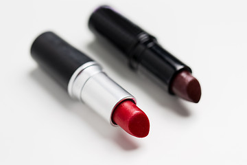 Image showing close up of two open lipsticks