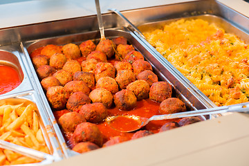 Image showing close up of meatballs and other dishes on tray
