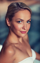 Image showing close up of woman in swimsuit at swimming pool