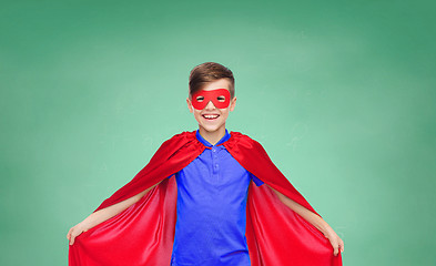 Image showing boy in red super hero cape and mask