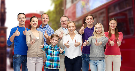Image showing group of people showing thumbs up over london city