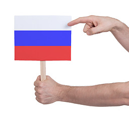 Image showing Hand holding small card - Flag of Russia