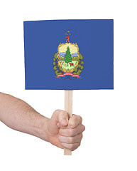 Image showing Hand holding small card - Flag of Vermont