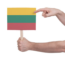 Image showing Hand holding small card - Flag of Lithuania