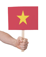 Image showing Hand holding small card - Flag of Vietnam