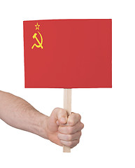 Image showing Hand holding small card - Flag of the USSR