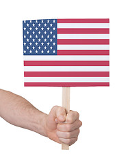 Image showing Hand holding small card - Flag of the USA