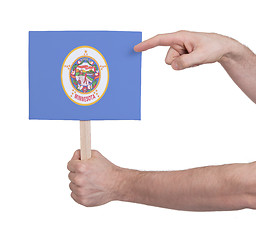 Image showing Hand holding small card - Flag of Minnesota