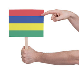 Image showing Hand holding small card - Flag of Mauritius