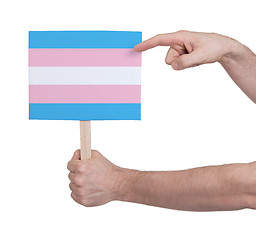 Image showing Hand holding small card - Flag of Trans Pride