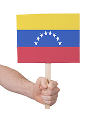 Image showing Hand holding small card - Flag of Venezuela