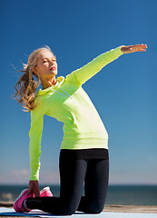 Image showing woman doing sports outdoors