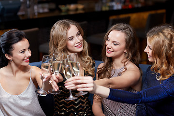 Image showing happy women with champagne glasses at night club