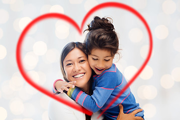 Image showing happy mother and daughter hugging