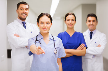 Image showing group of medics pointing finger on you at hospital