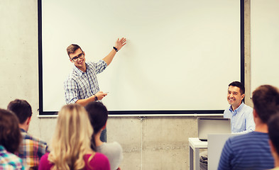 Image showing group of students and teacher in classroom