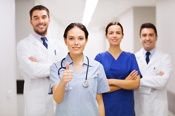 Image showing medics or doctors at hospital showing thumbs up