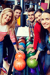 Image showing happy friends in bowling club