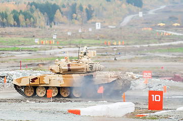 Image showing Tank T-90S moves with turret turned back