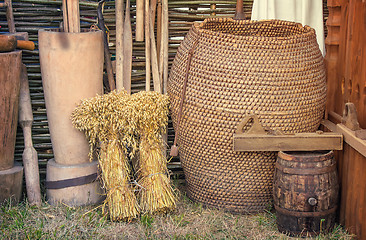 Image showing Two beams and ancient objects of rural life.