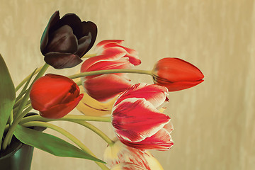 Image showing Beautiful bouquet of tulips in a ceramic vase.
