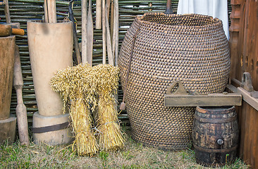Image showing Two beams and ancient objects of rural life.