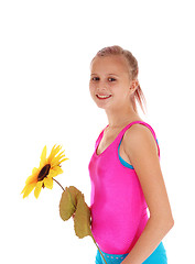 Image showing Young girl standing in bathing suit. 